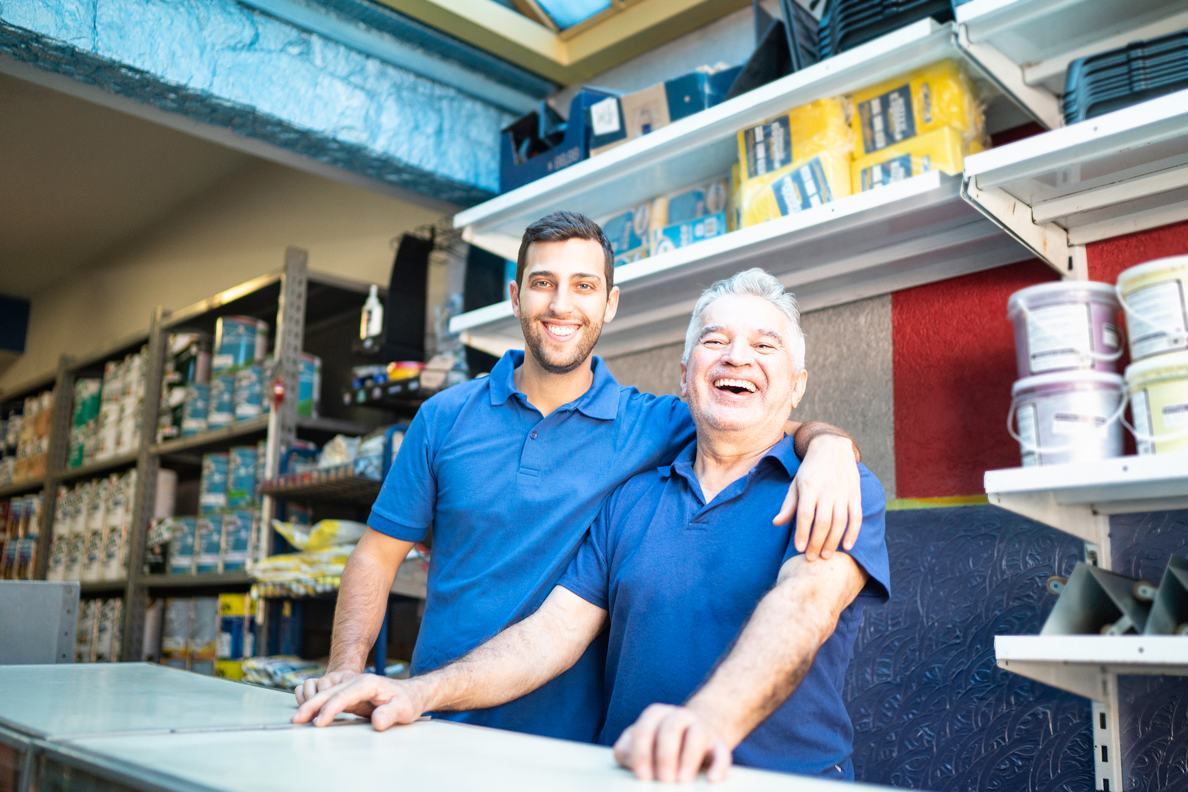 Father and son owners of paint store