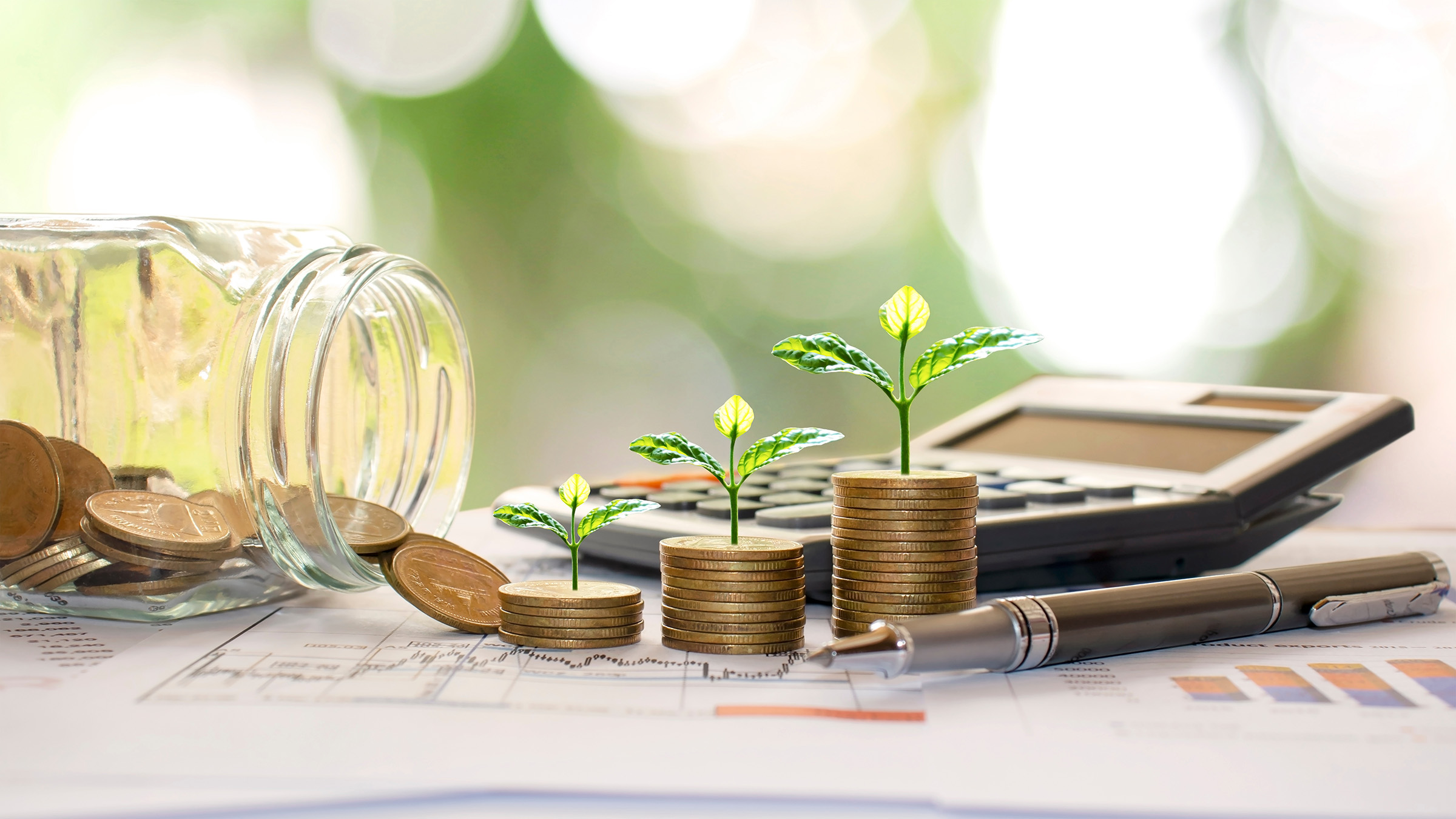 Calculator close up with coins