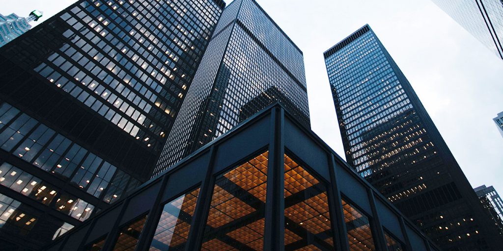 Looking up at buildings in the city